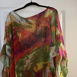 Women’s Dolman sleeve, tunic.  Partial elastic panels at the waist, on each side